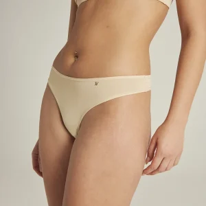 Nudea - String stretch teinté couleur chair